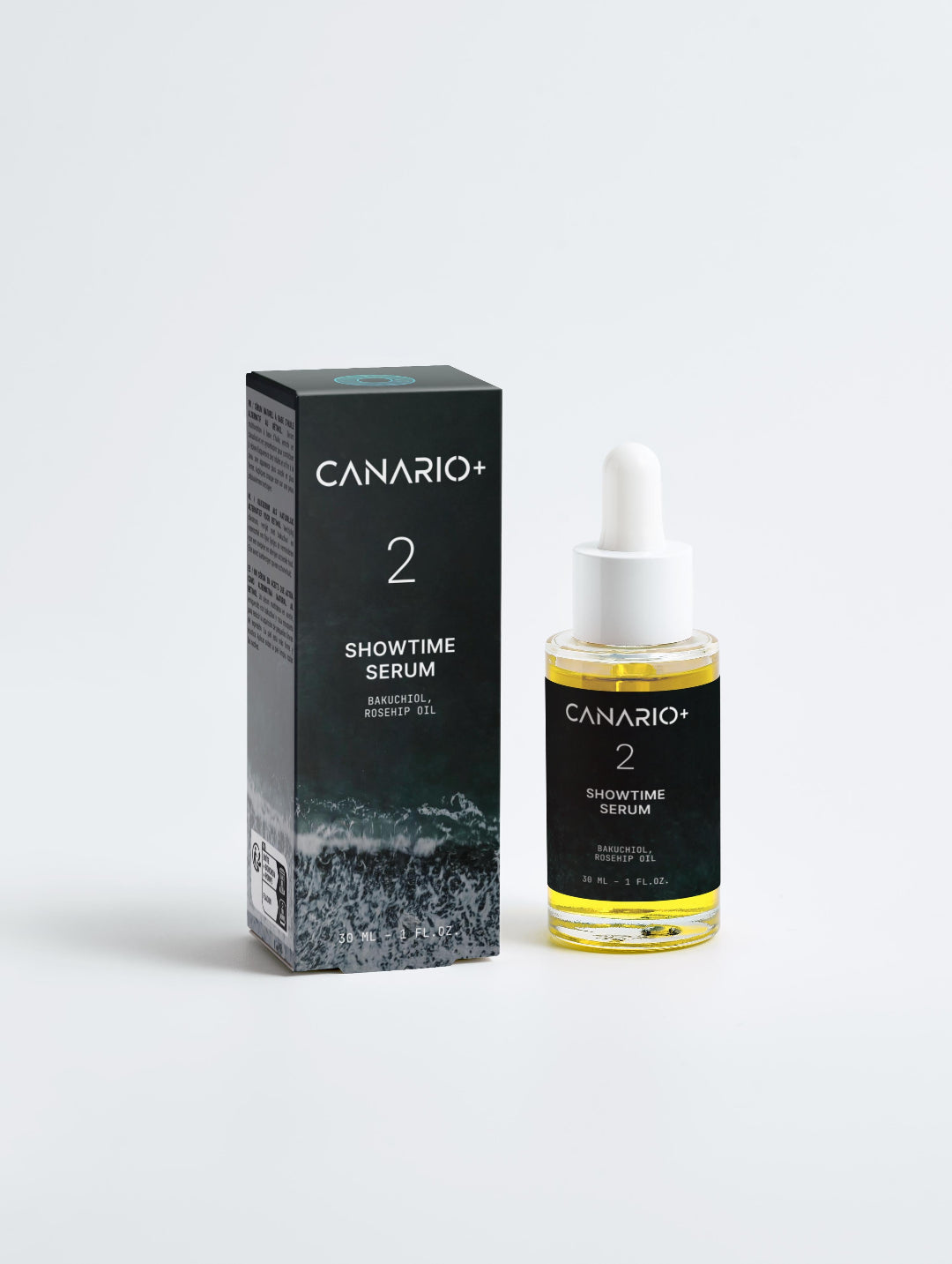 Product shot Showtime Serum, 30ml, glass bottle with dropper applicator. Sleek black Canario Plus label with key ingredients Bakuchiol and Rosehip Oil. The number 2 for the step in the routine. 